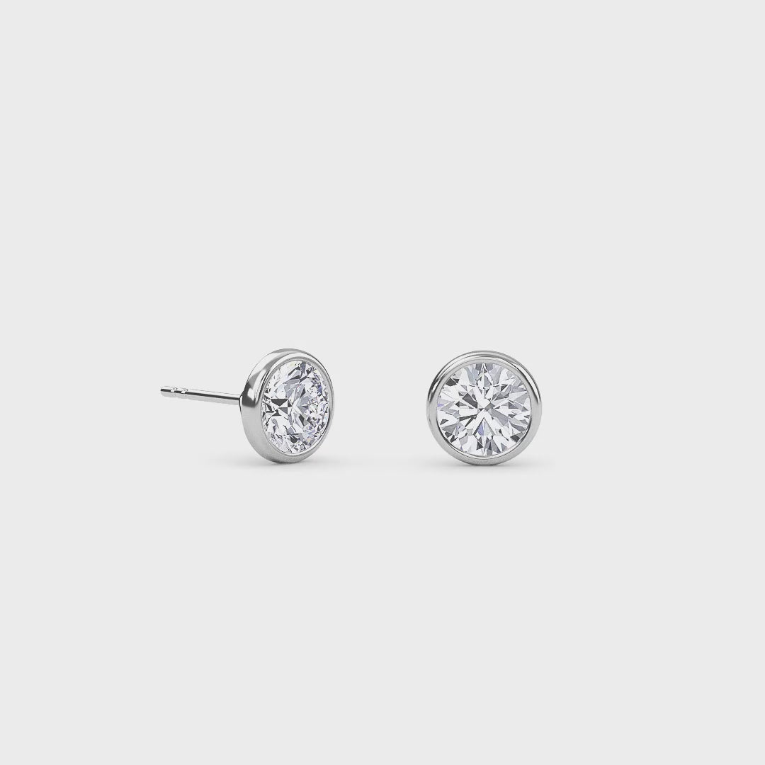 0.77 Carat Round Bezel Set Solitaire Earrings